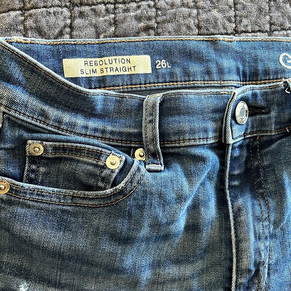 Blue jeans lightly destructed